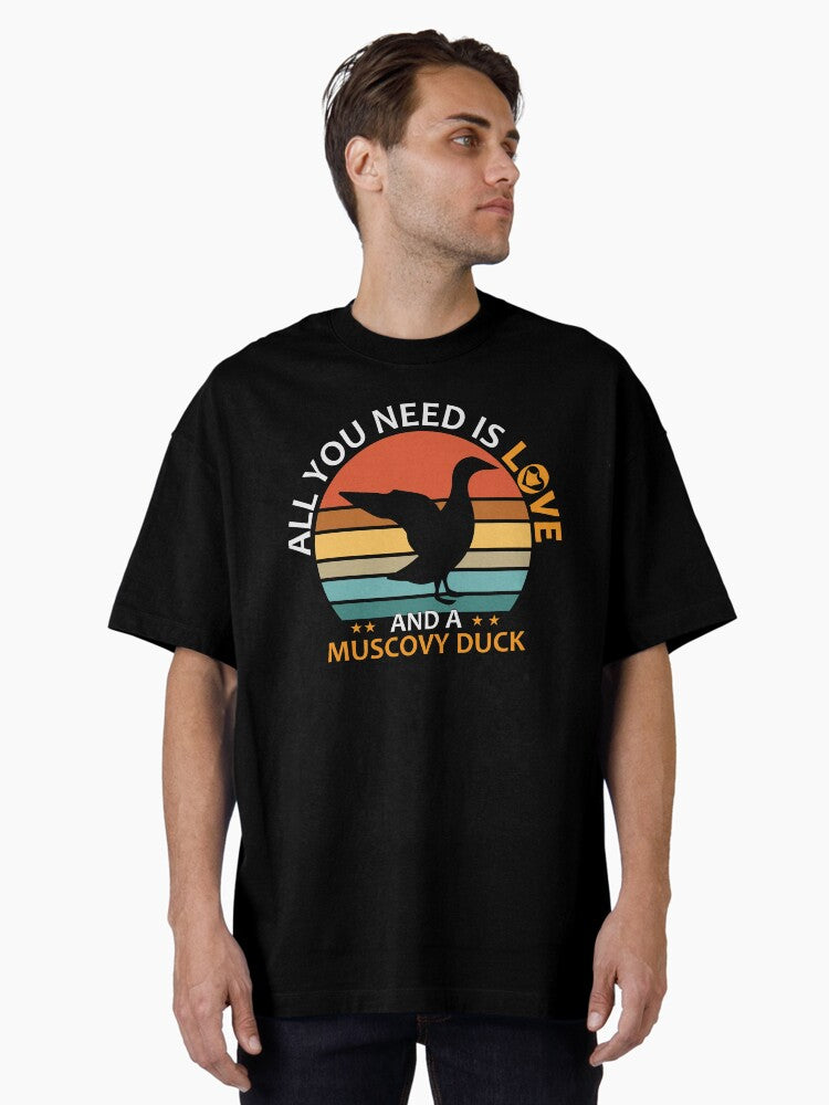 All You Need Is Love and a Muscovy Duck Gifts Idea for Muscovy Duck Lovers Oversized T Shirt T Shirt | Trending 2025...