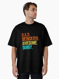DAD dedicated awesome dorky dad jokes funny fathers day papa pops birthday Oversized T Shirt T Shirt | Viral US Style...