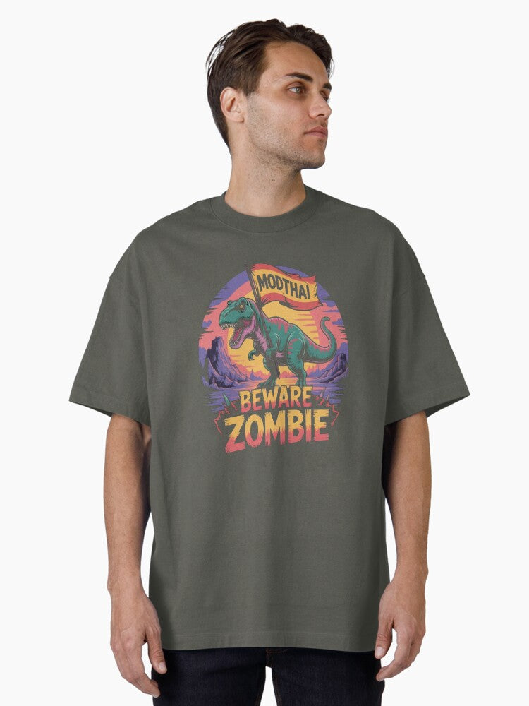 MODTHAI T Rex Holding Flag Beware Zombie Post Apocalyptic Dino Oversized T Shirt T Shirt Premium Print Futuristic Style