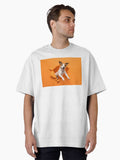 Funny jack russell terrier comes out of a paper orange background tearing it Oversized T Shirt T Shirt Aesthetic Fit Fan