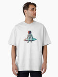 Cosmic Cruise Serene Astronaut Skims the Interstellar Sea Oversized T-Shirt | Graphic T-Shirt for Unisex