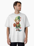 A cheerful elf with pointed ears holding a wrapped gift Oversized T Shirt T Shirt Premium Print Daily Wear