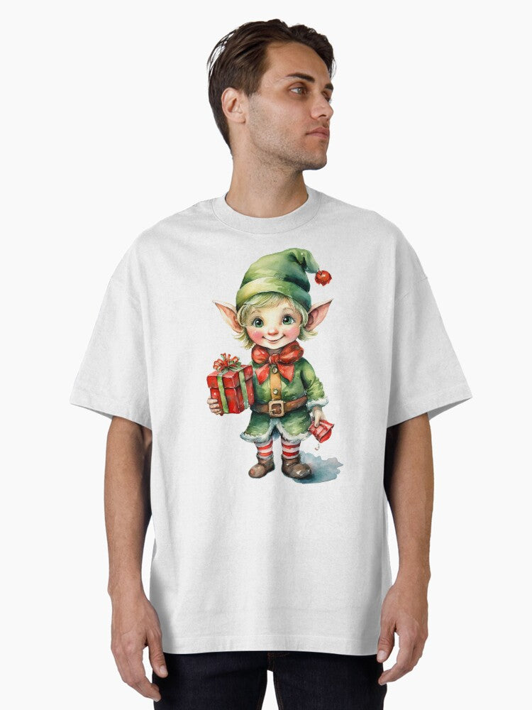 A cheerful elf with pointed ears holding a wrapped gift Oversized T Shirt T Shirt Premium Print Daily Wear
